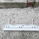 Portemanteau ancien en fonte émaillée