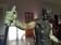 bronze sculpture athlete bending an iron bar by Jean de Roncourt on an art deco marble base
