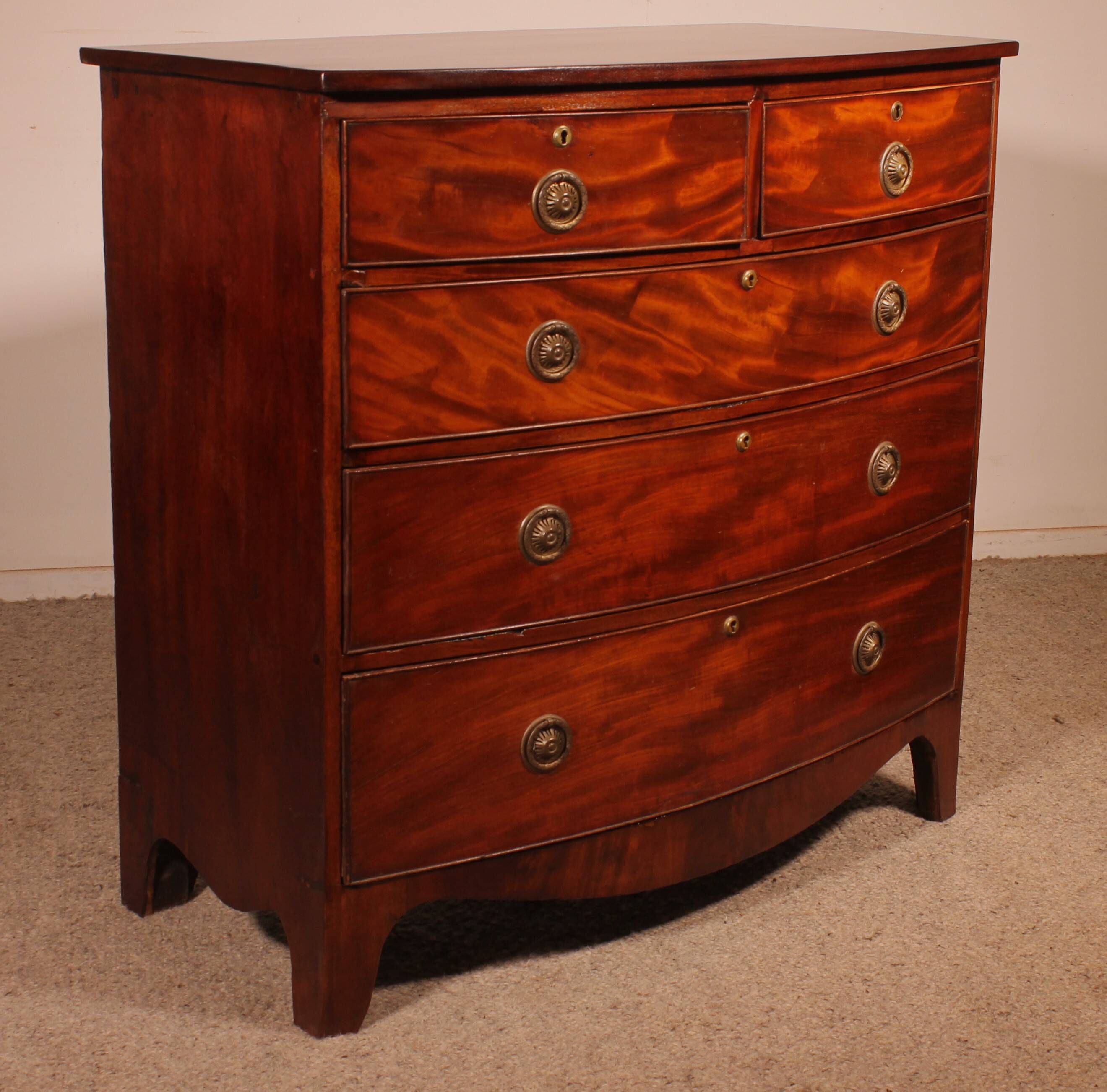 Regency period bombé commode in mahogany