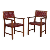 Paire de fauteuils bridges en bois et cuir des années 1950