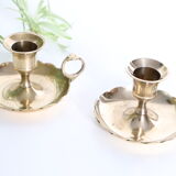 Duo of rat candlesticks in gilded brass