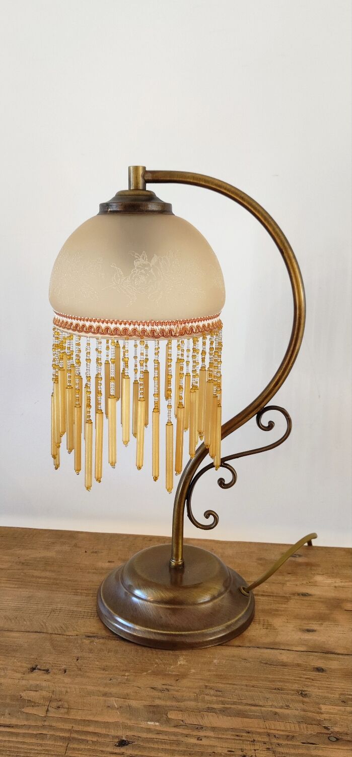 Lamp in glass paste and tassels