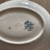 Old saucie bottle on frame with longwy daisy lid terre de fer