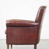 Sheep leather armchair correctly finished with decorative nails