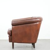 Cognac-coloured cow leather club armchair in English style
