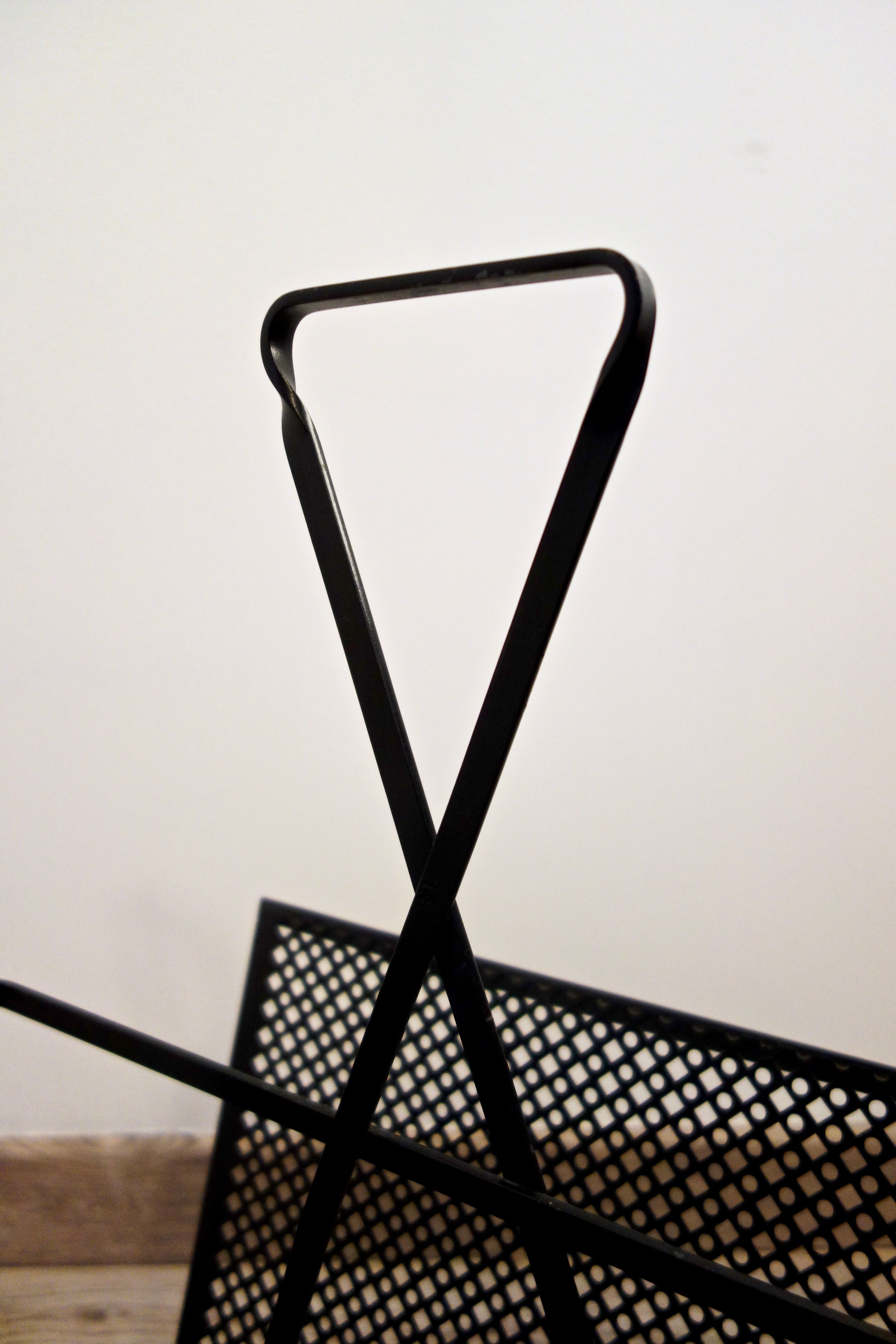 Mathieu Matégot's magazines rack from the 1950s