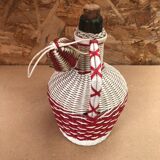 Ancienne bouteille en scoubidou tressé