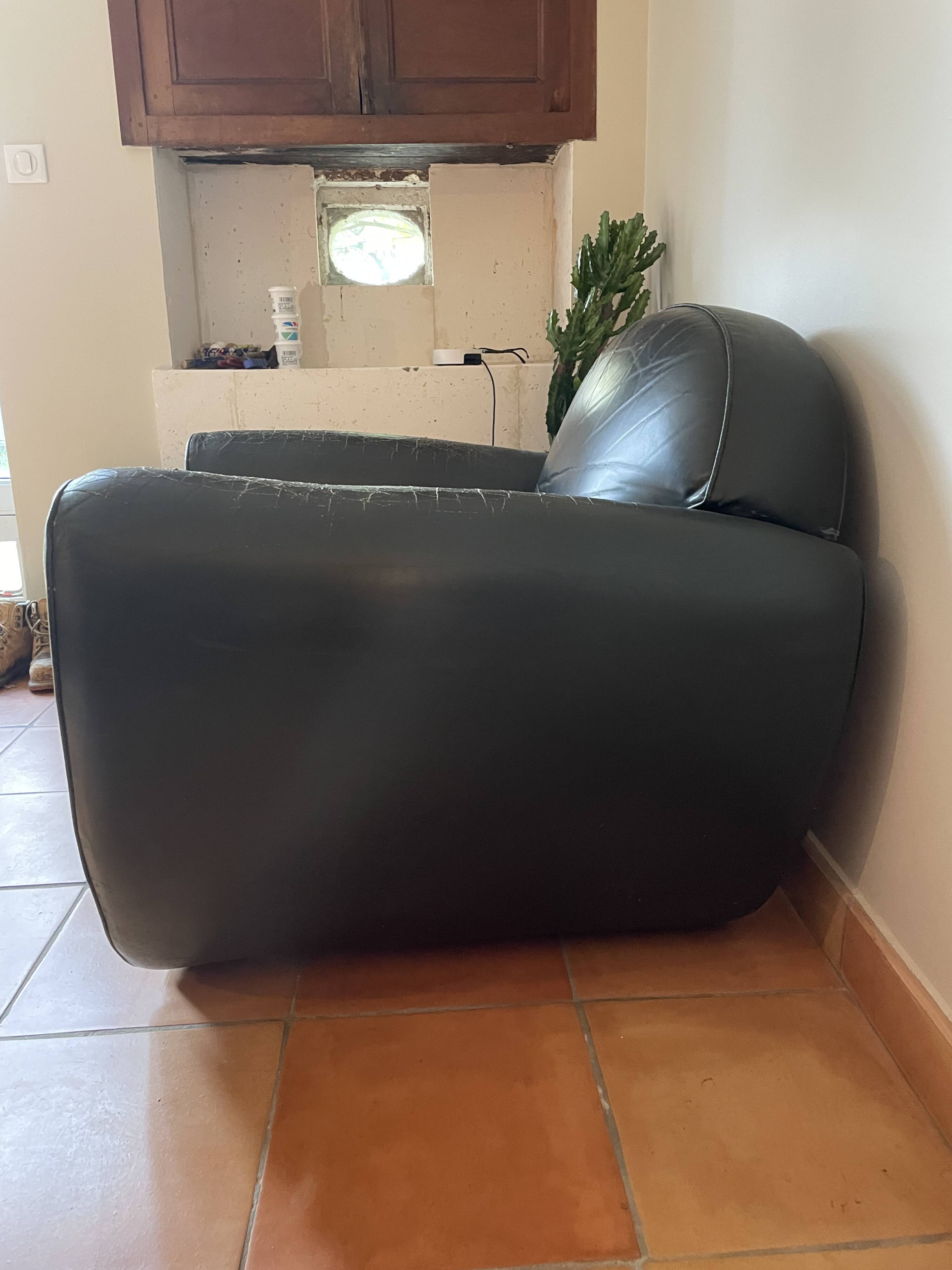 Green leather club chairs