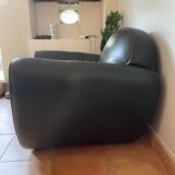 Green leather club chairs