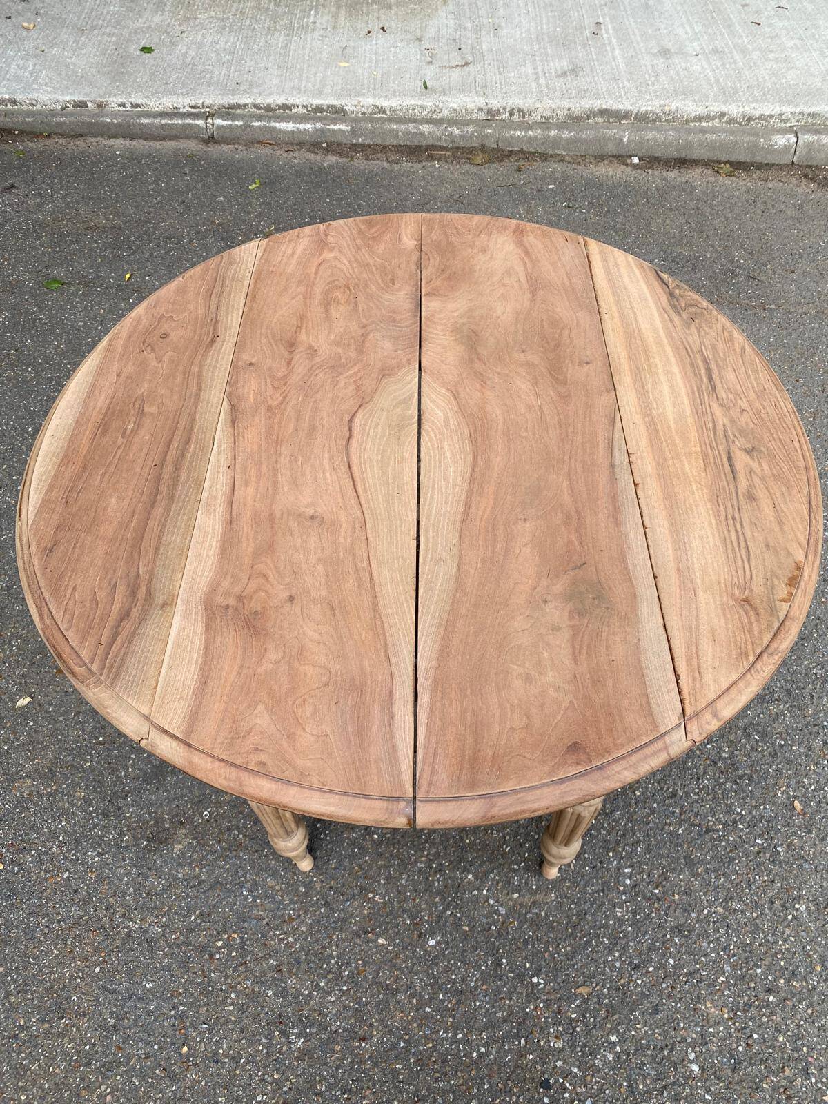 Renovated 18th century solid wood extendable round dining table with shutters