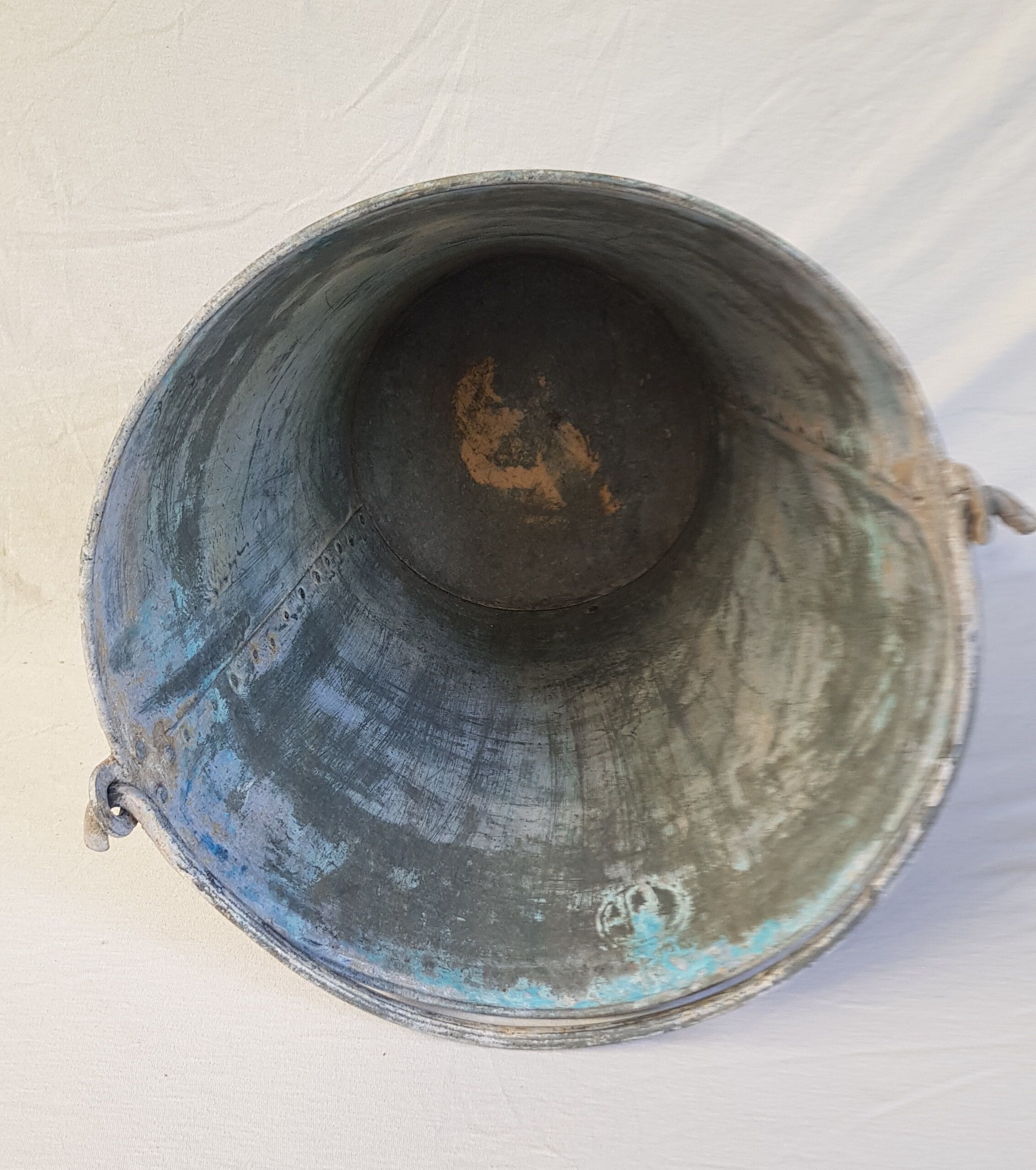 Old bucket with thick zinc handle