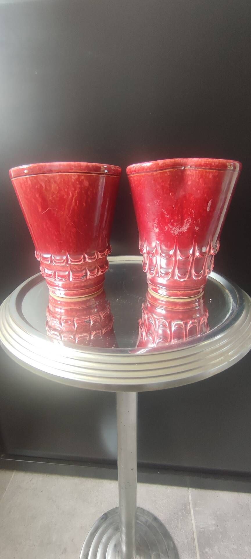 Pair of Art Deco asymmetrical red oxblood ceramic vases