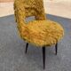 Old mustard furry armchair