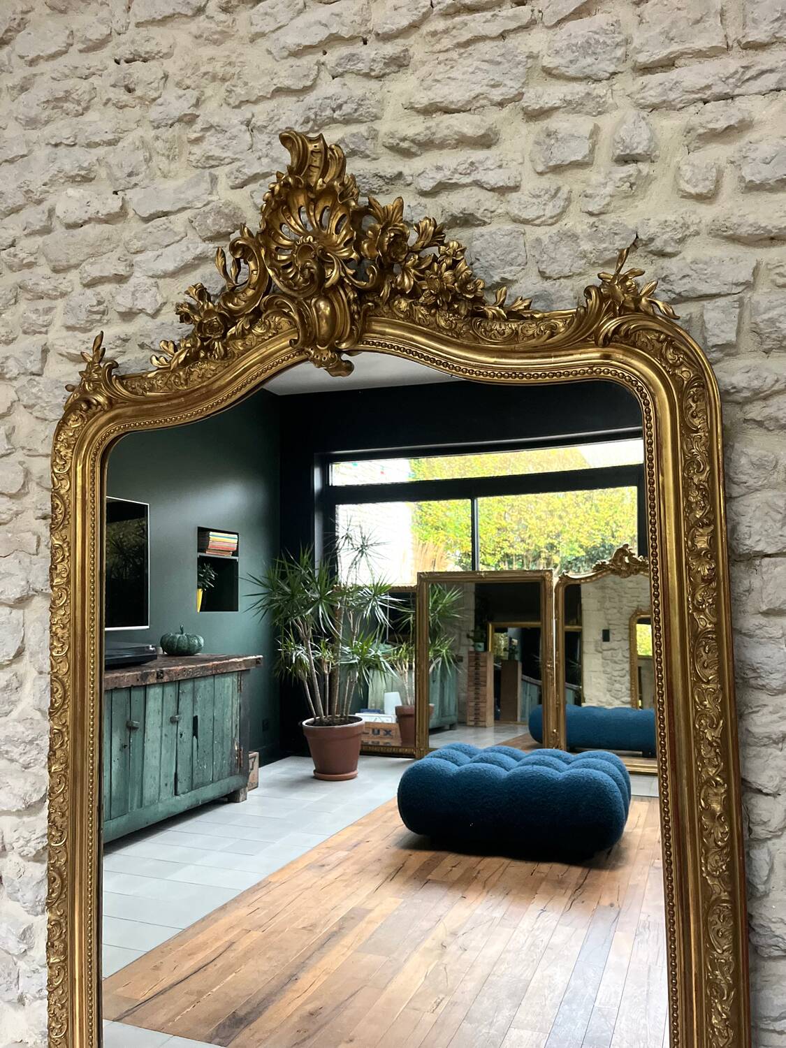 Antique mirror 183.5/116cm with pediments and pearl detailing in gold leaf.