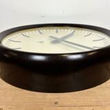 Industrial bakelite factory wall clock from Pragotron, 1960s