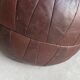 Vintage dark brown patchwork ottoman / poof