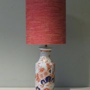 Vintage ceramic table lamp with an Imari-inspired pattern.