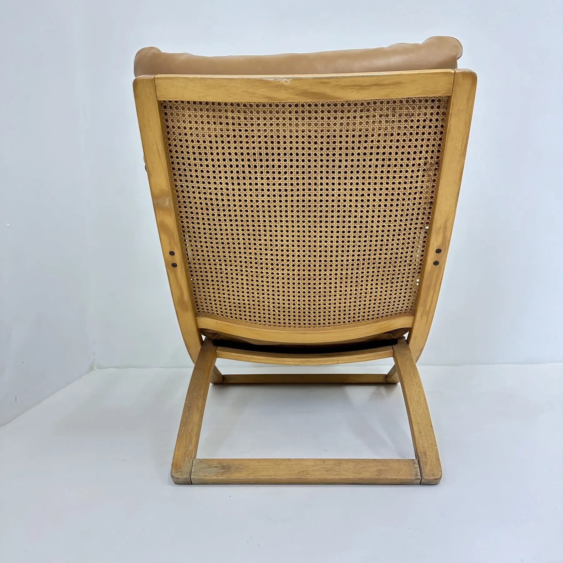 Vintage lounge chair cognac leather with webbing, 1970s