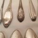 Set of mismatched silvered metal cutlery