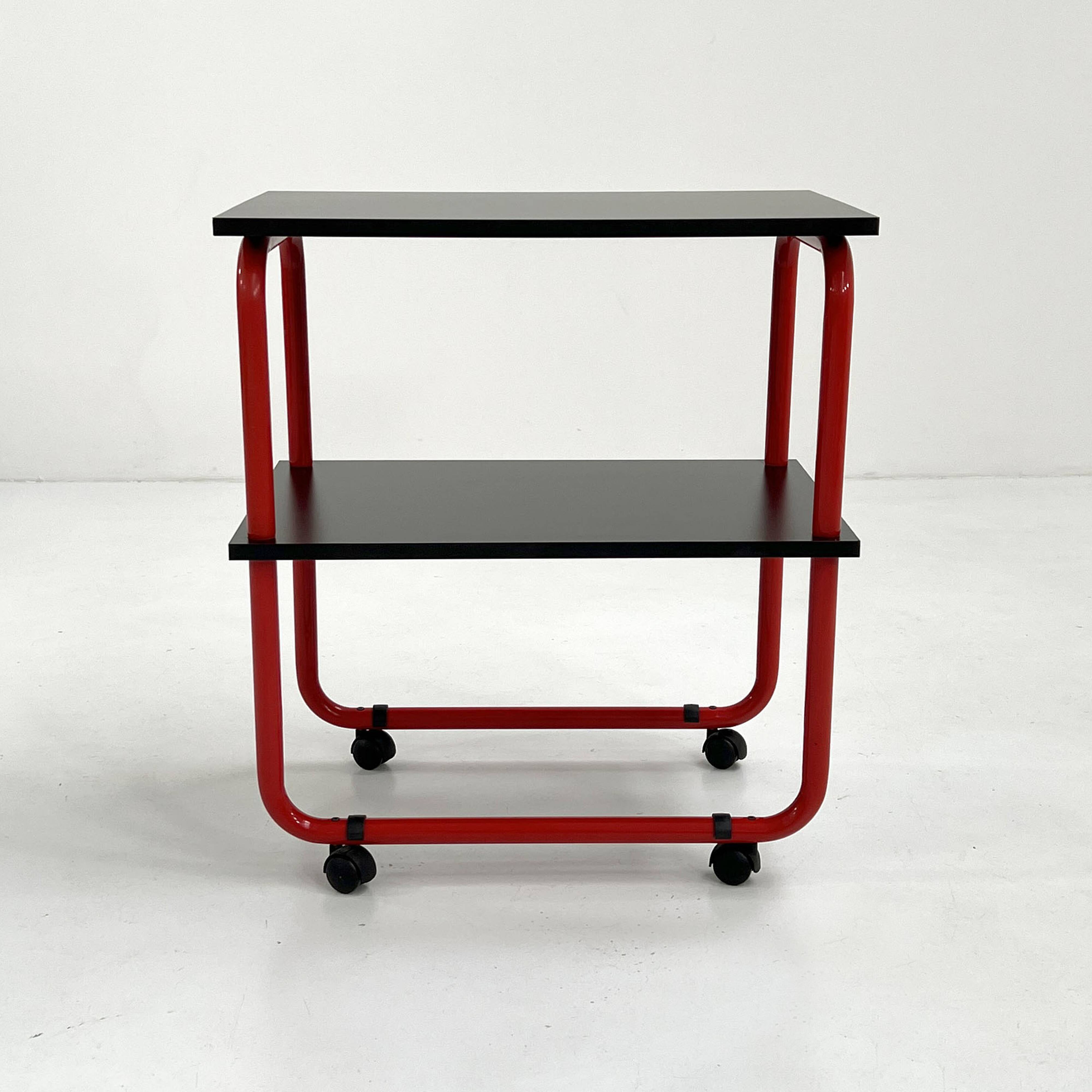 Tubular metal and wood serving trolley, 1980