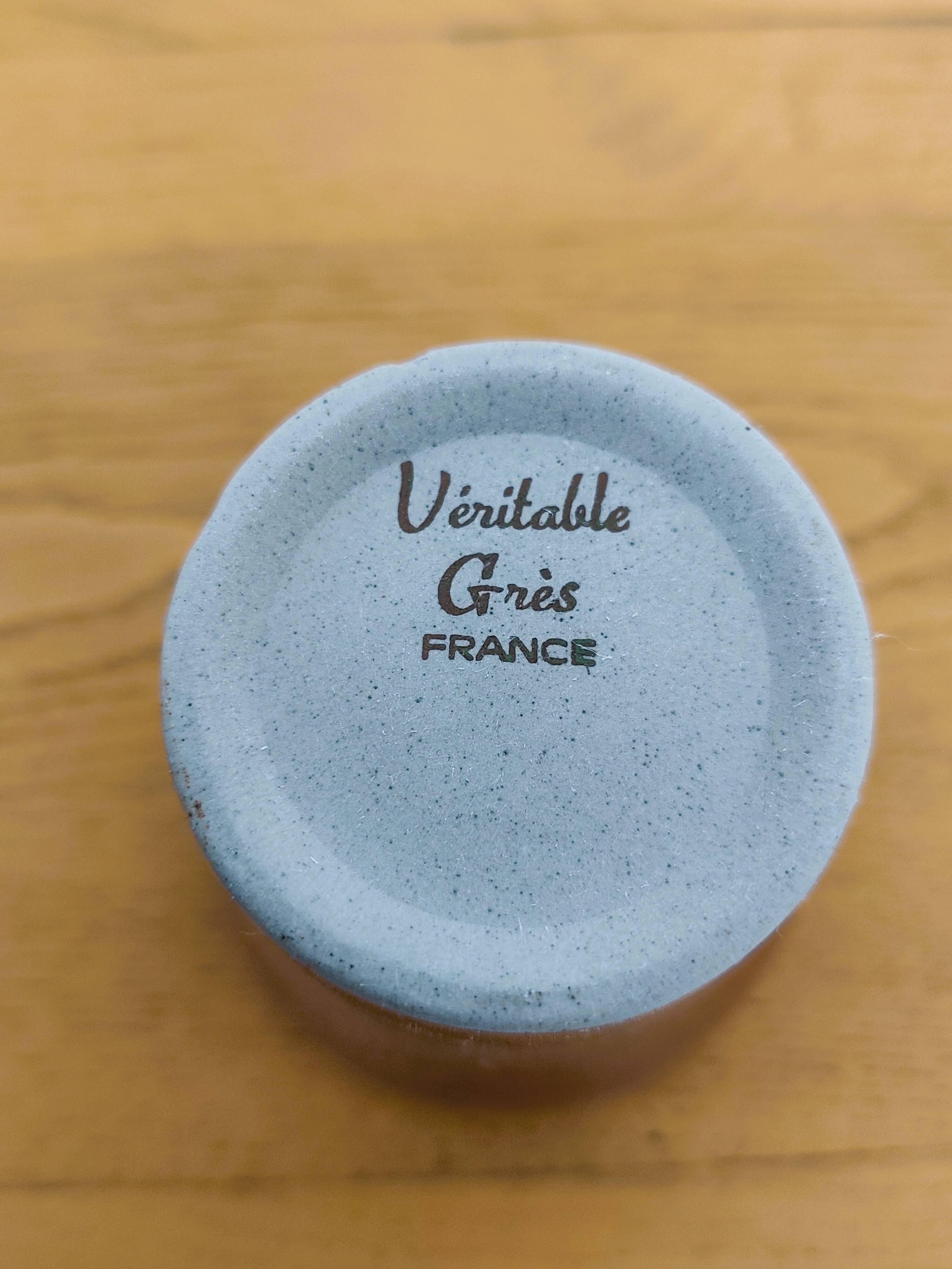 Stoneware cups – Armor stoneware set of 10 and an 11th French stoneware cup.