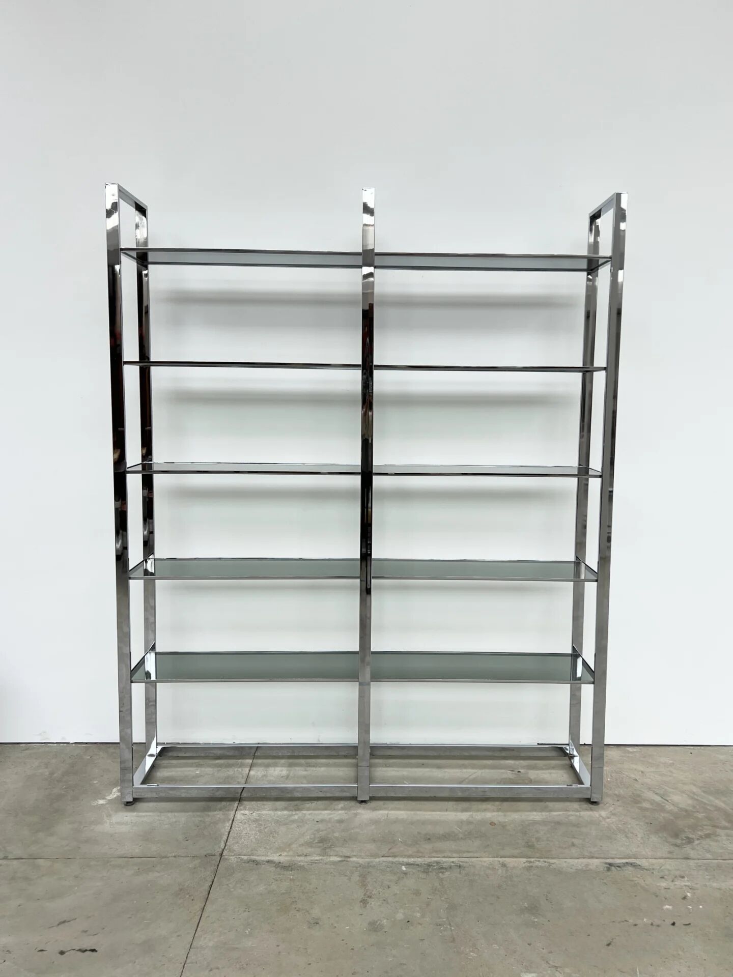 Chrome bookshelf with smoked glass — Italy, 1970s