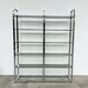 Chrome bookshelf with smoked glass — Italy, 1970s