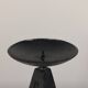 Vintage candle holder made of hand-forged metal, in a brutalist style.