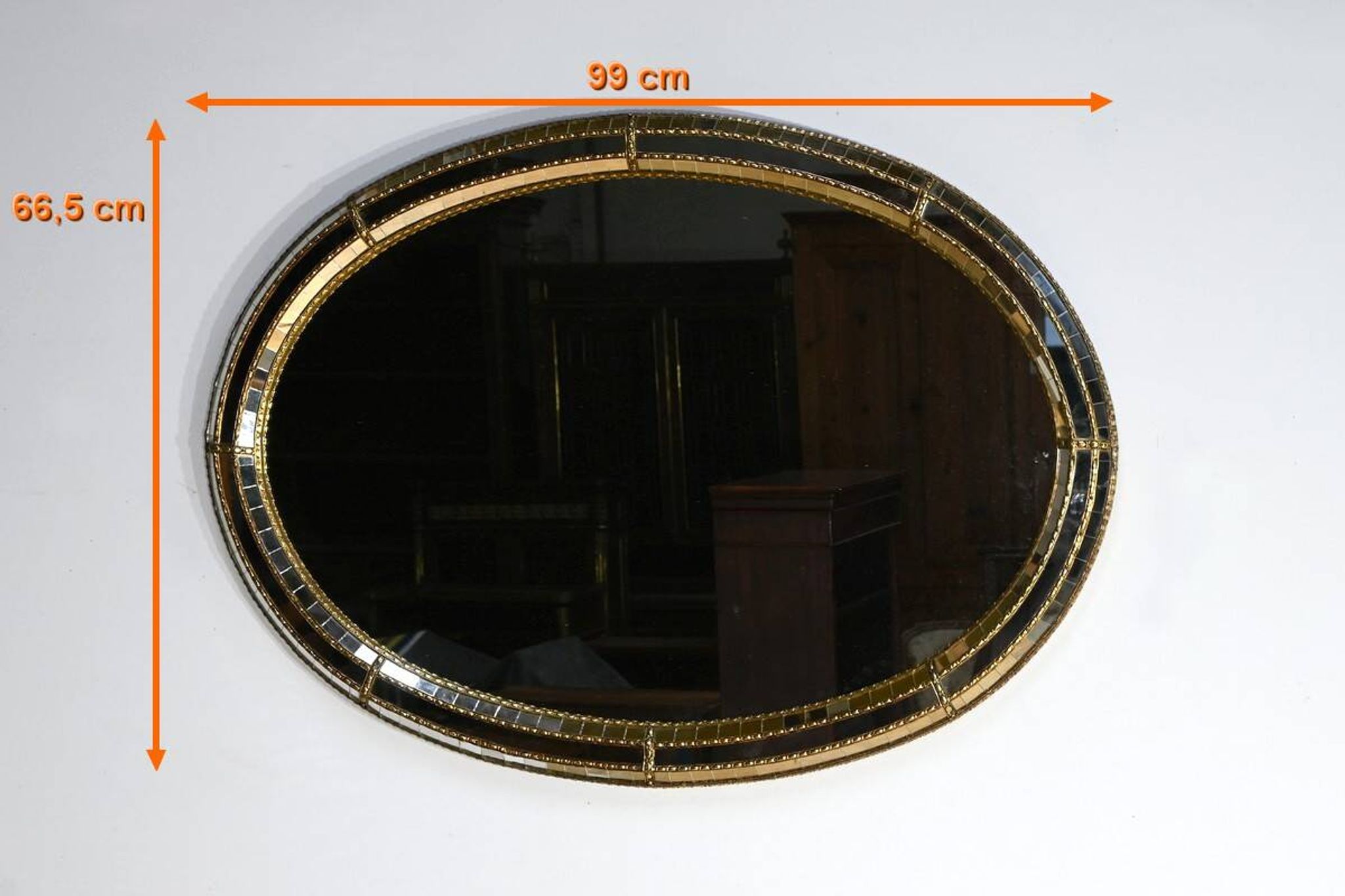 Miroir ovale à parclose en laiton, style hollywood regency – 1970