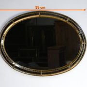 Miroir ovale à parclose en laiton, style hollywood regency – 1970