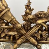 Miroir a parecloses de style Louis XVI en bois et stuc doré XIX siècle