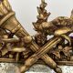 Louis XVI style mirror with parecloses in wood and gilded stucco, 19th century