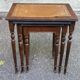 3 nesting tables in solid wood and tawny leather from the 1950s.