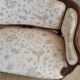 Small sofa or bench in Louis XV style, rococo.