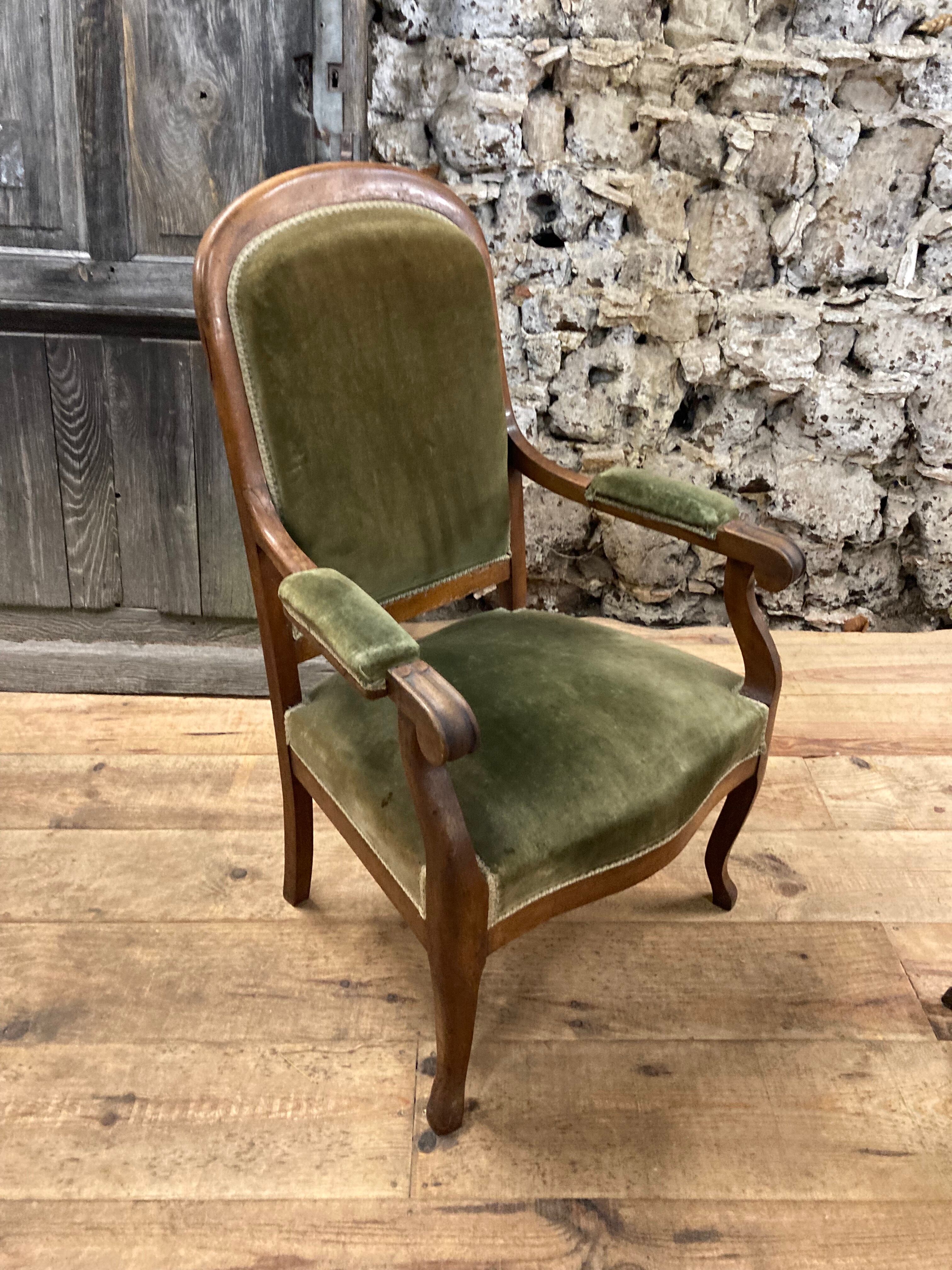 Antique Voltaire armchair in wood and green velvet Louis Philippe