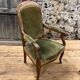 Antique Voltaire armchair in wood and green velvet Louis Philippe