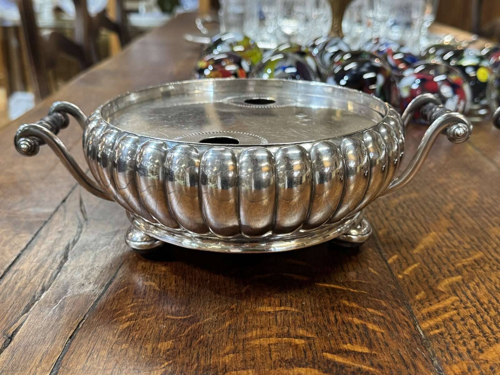 Pair of silver-plated hot plates from the 1950s.