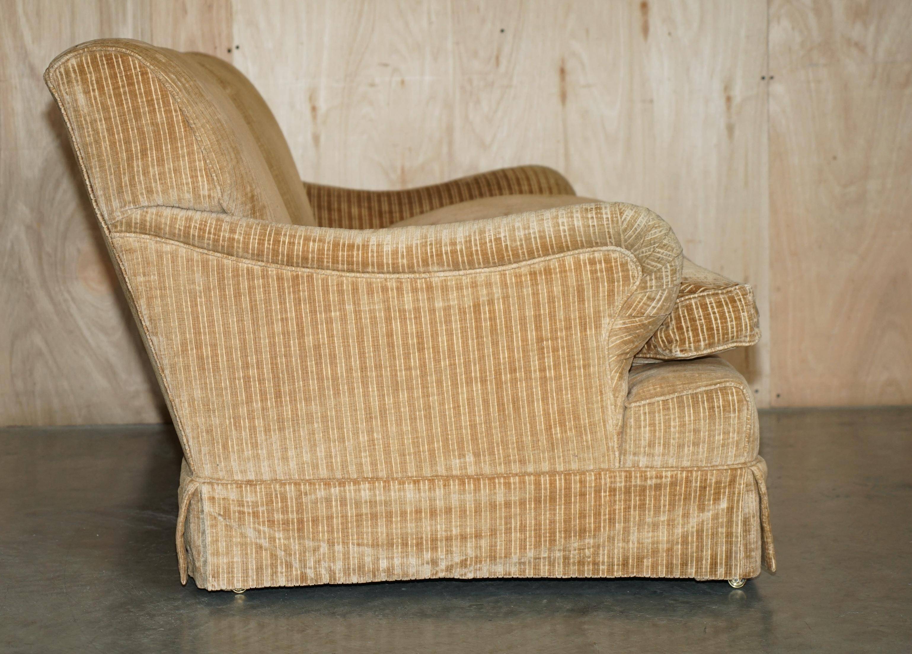 Howard & Sons / Chairs Ltd two-seater canapé with feather-filled cushions.