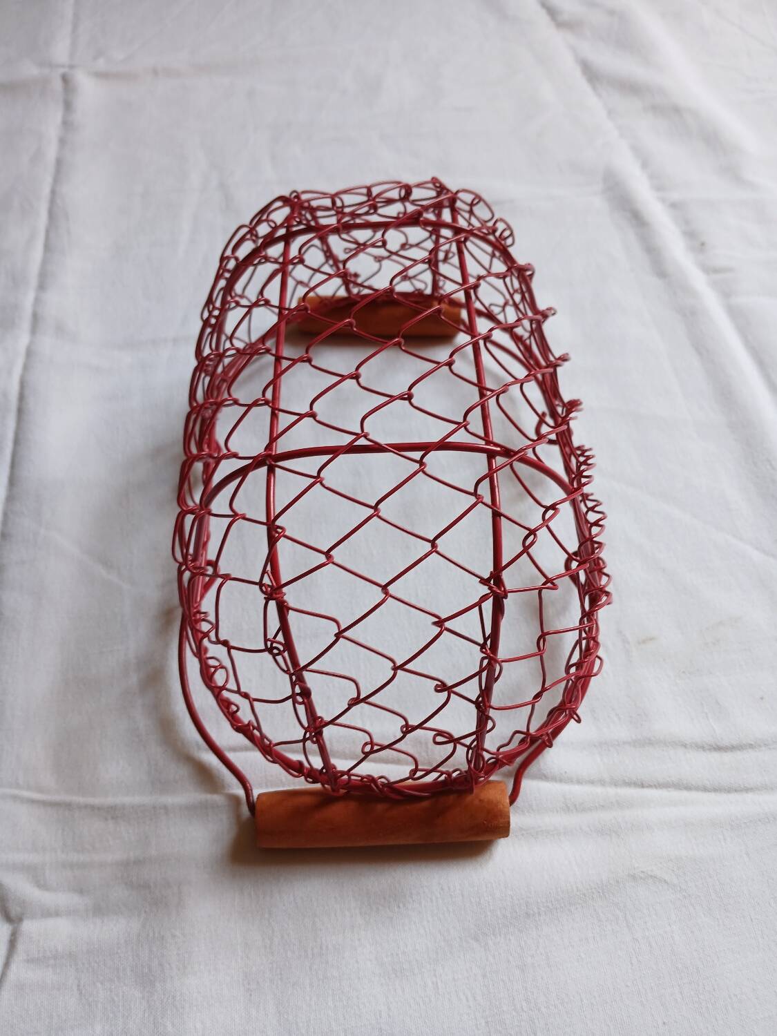 Small red metal basket