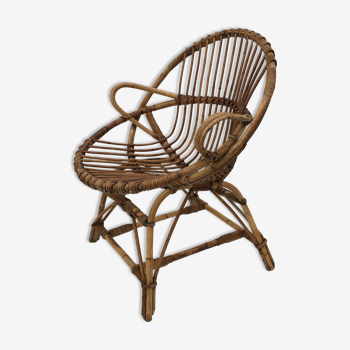 Rattan armchair shaped shell