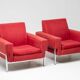 Red Kiushu armchairs by Saporiti characteristic of mid-20th century Italian modern design.