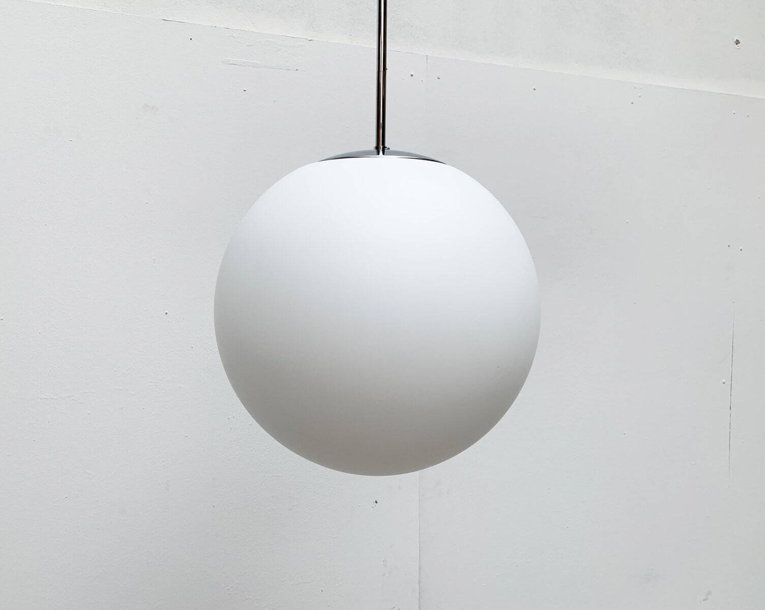 Vintage German space age glass ball pendant lamp by Limburg.