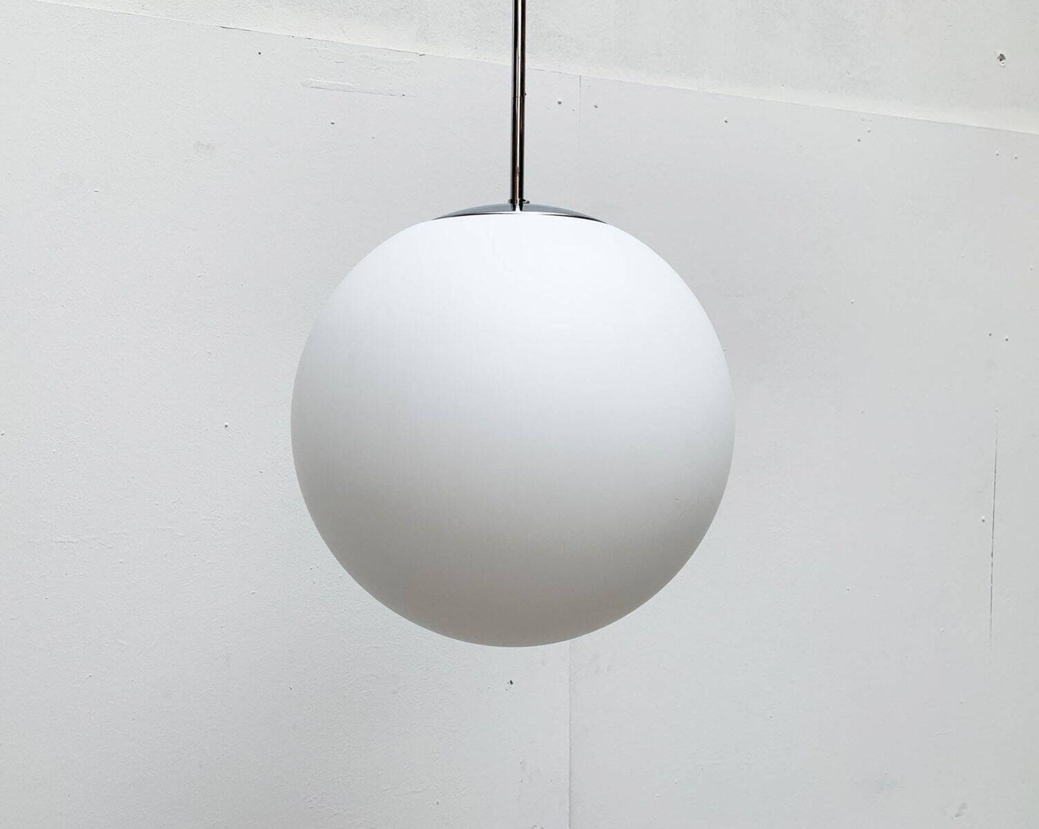 Vintage German space age glass ball pendant lamp by Limburg.