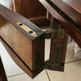 Console transforming into a 19th century Louis XV style gaming table