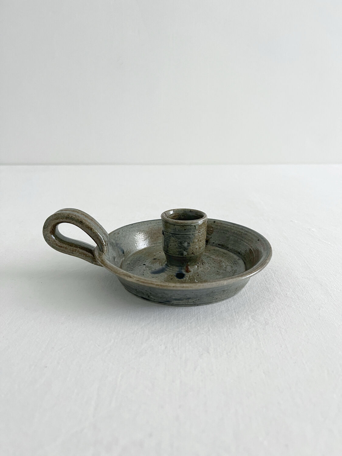 Vintage glazed stoneware hand candlestick