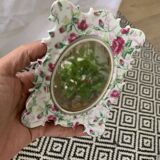 Miroir ancien en porcelaine motif roses