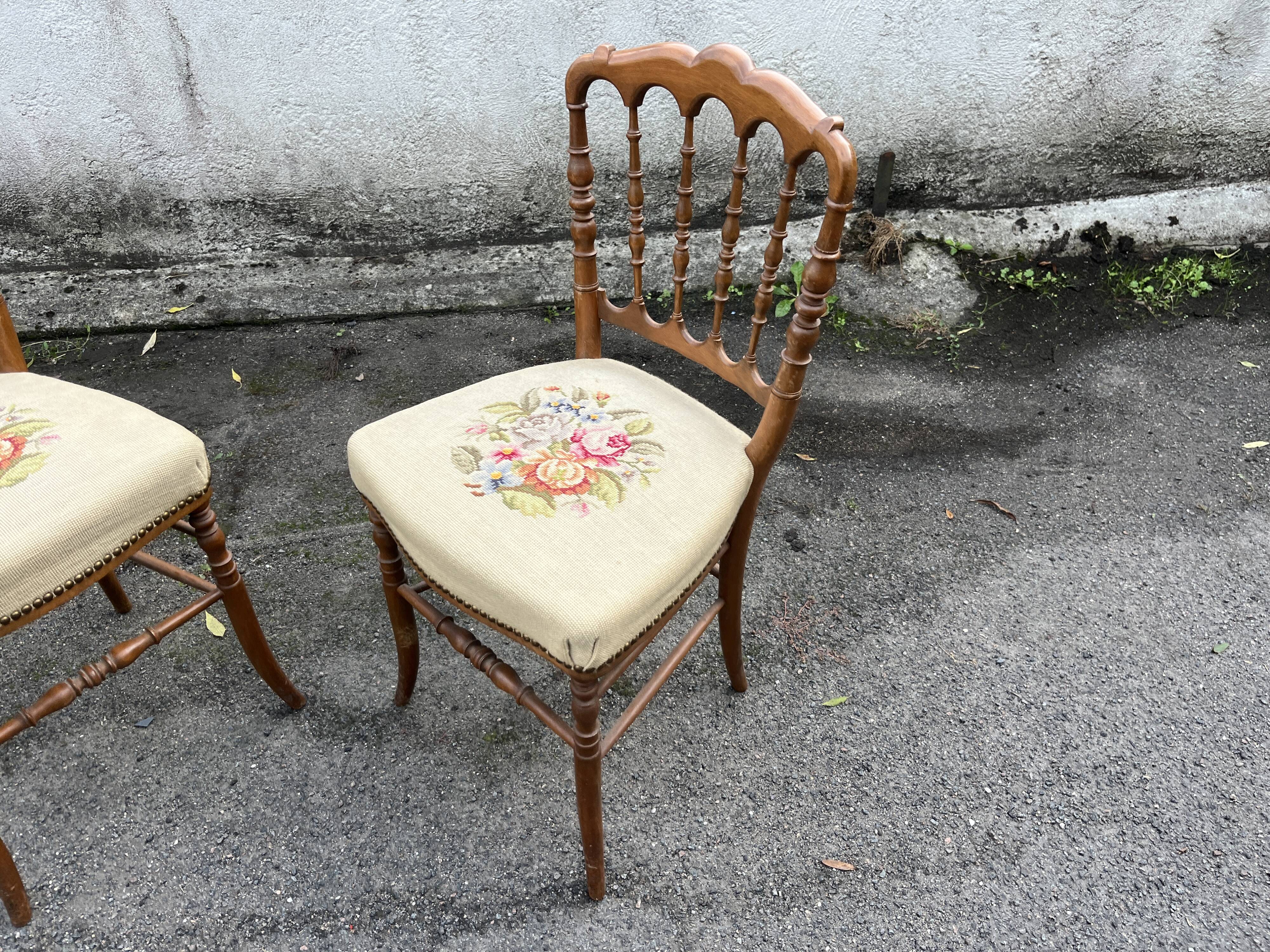 Pair of antique turned wooden chairs, embroidered upholstered seats