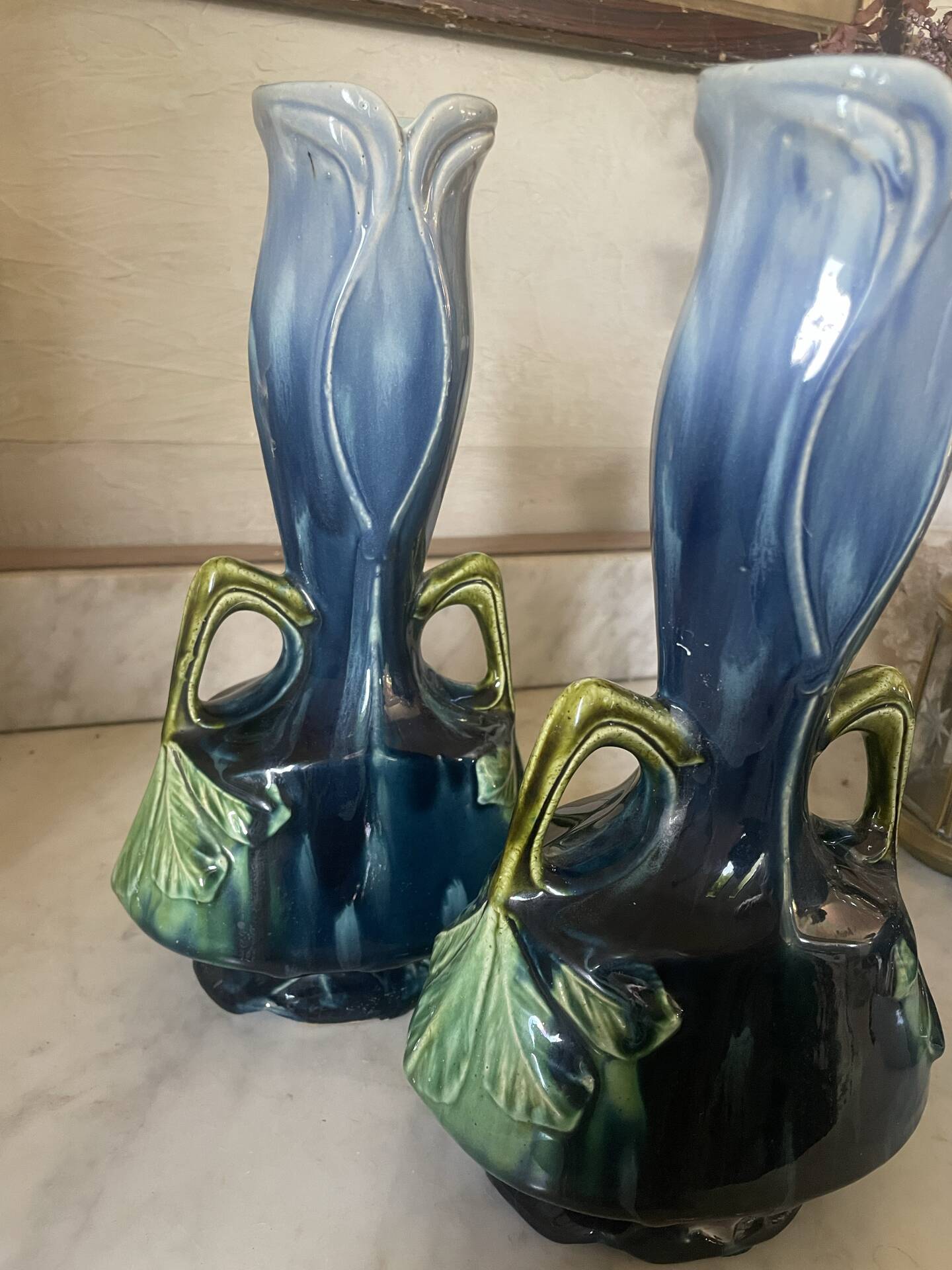 Pair of vases in slipware with Art Nouveau floral decoration.