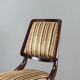 Lot de huit chaises vintage avec embouts en laiton