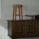 Danish sculptural stool from the mid-century modern period with a lambswool seat, 1960s.